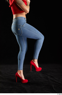 Daisy Lee 1 blue jeans dressed flexing leg red high…